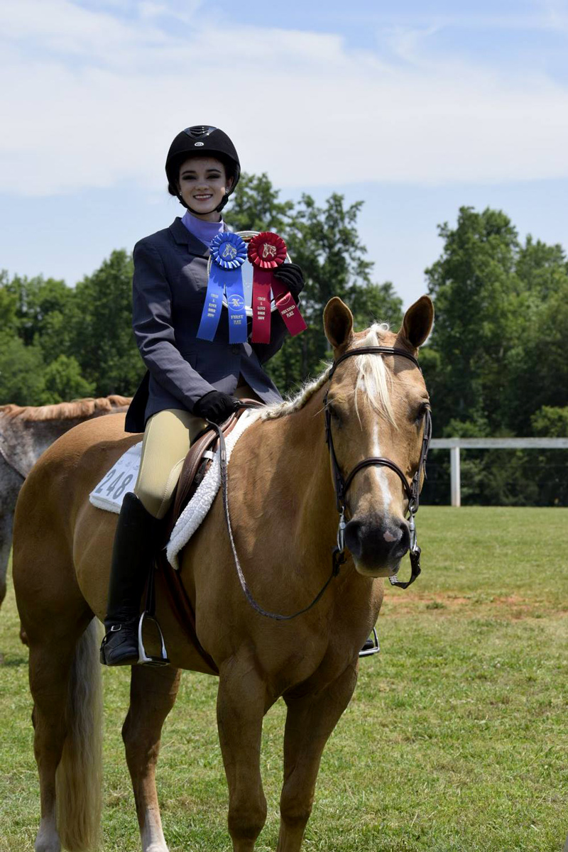 Kendall and Ravi win at a local horse show